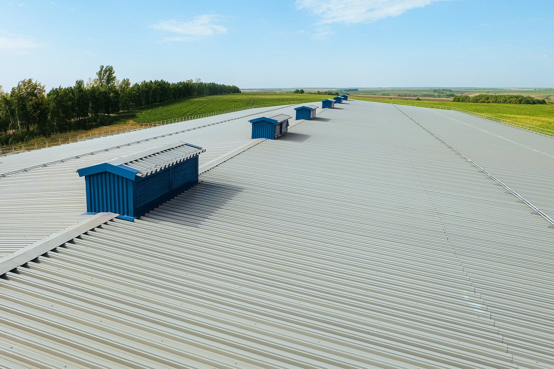 Industrial building covered with profiled PVC sheets