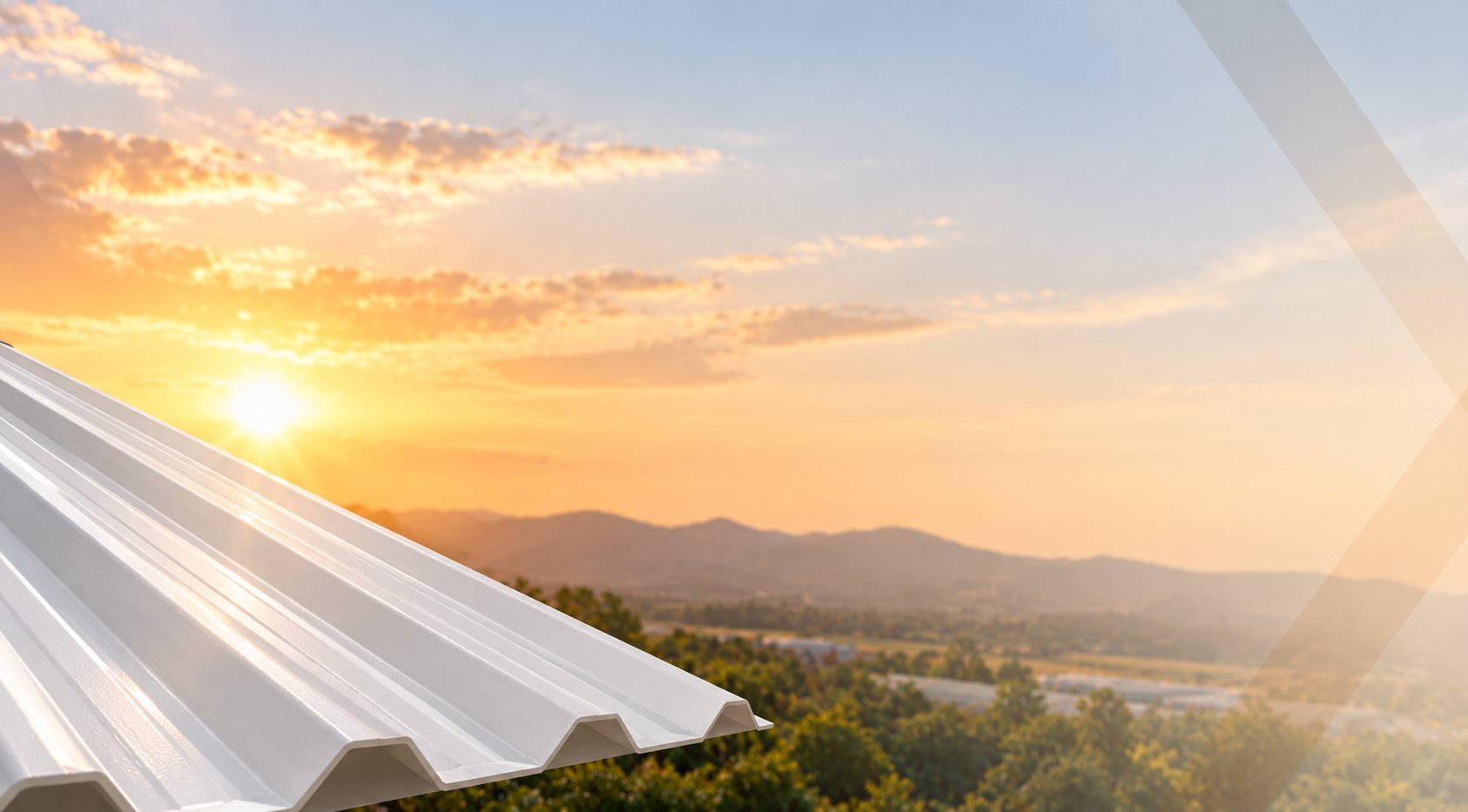Solar panels on a rooftop at sunset with mountains and valley landscape visible in the background